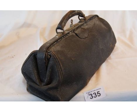  Sale Item:    GLADSTONE BAG WITH KEY- KEY IN OFFICE (AF)  Vat Status:   No Vat   Buyers Premium:  This lot is subject to a B