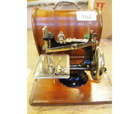  Sale Item:    LEAD SEWING MACHINE   Vat Status:   No Vat   Buyers Premium:  This lot is subject to a Buyers Premium of 15% +