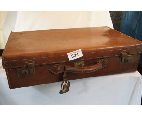  Sale Item:    LEATHER SUITCASE WITH KEY (AF) (SLIGHTLY WORN)  Vat Status:   No Vat   Buyers Premium:  This lot is subject to
