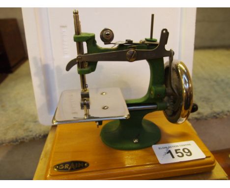  Sale Item:    GRAIN SEWING MACHINE   Vat Status:   No Vat   Buyers Premium:  This lot is subject to a Buyers Premium of 15% 