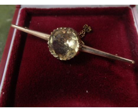  Sale Item:    9 CT GOLD & CITRINE BAR BROOCH   Vat Status:   No Vat   Buyers Premium:  This lot is subject to a Buyers Premi