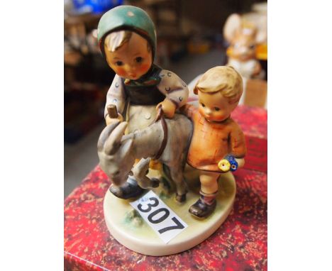  Sale Item:    HUMMEL FIGURE- HOMEWARD BOUND BEEN REPAIRED (AF)  Vat Status:   No Vat   Buyers Premium:  This lot is subject 