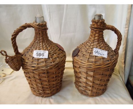  Sale Item:    2 BASKET COVER WINE JARS   Vat Status:   No Vat   Buyers Premium:  This lot is subject to a Buyers Premium of 