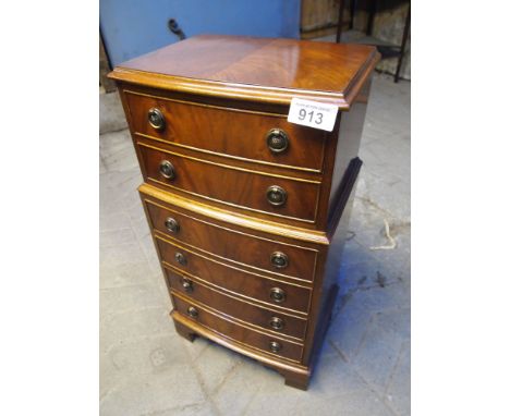  Sale Item:    SMALL REPRO 6 DRAWER BOW FRONTED CHEST  Vat Status:   No Vat   Buyers Premium:  This lot is subject to a Buyer