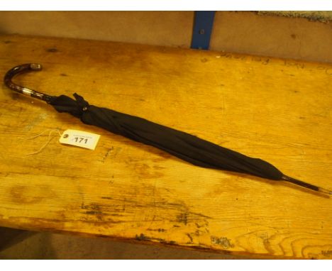  Sale Item:    SILVER MOUNTED BROLLEY   Vat Status:   No Vat   Buyers Premium:  This lot is subject to a Buyers Premium of 15