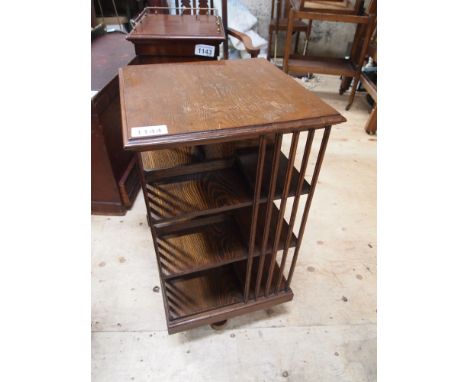  Sale Item:    OAK REVOLVING BOOKCASE   Vat Status:   No Vat   Buyers Premium:  This lot is subject to a Buyers Premium of 15