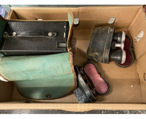 An old camera and two set of opera glasses
