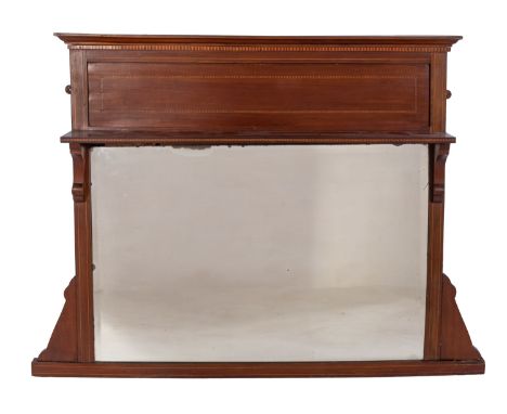 An Edwardian mahogany mantel mirror, early 20th century; with cornice above a recessed chequer banded frieze and a shelf; the
