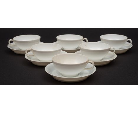 A set of French Limoge cups and saucers. In white having J.P.L stamped to the base, 20 cups approx. 
