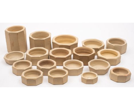 *Jeremy Leach [b.1941] A collection of unfired octagonal stoneware dishes, in a range of sizes and having an impressed mark t