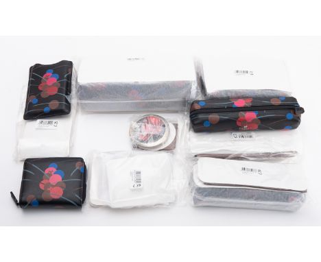 Radley. A group of Accessories in the colour 'Champagne Bubble', including two Pencil cases,a round compact mirror, A purse, 