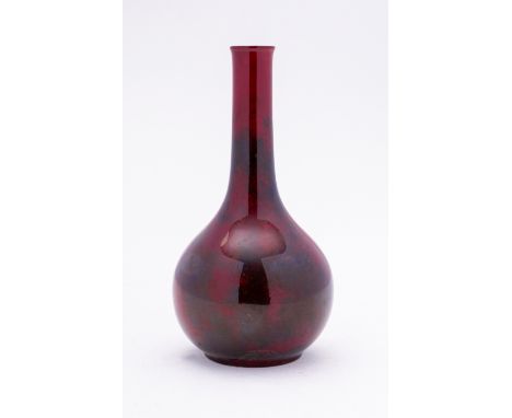 A E R Wilkes Spectria mottled Flambe bottle vase, signed E.R.Wilkes to base, 15.5cms high





