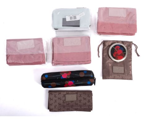 Radley. A collection of Radley accessories, including two purses in 'Ivory', a Pencil case and a Round Compact Mirror in 'Cha