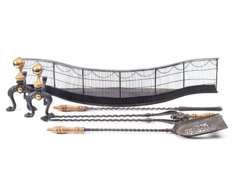 A set of three steel and brass mounted fire tools in 18th century style, early 20th century; comprising shovel, poker and ton