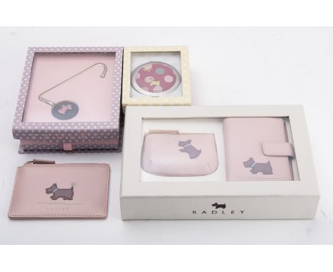 Radley. A collection of Radley accessories, including a Compact Mirror in 'Pink', a Make-up Bag with Compact Mirror in 'Berry
