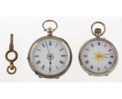 Two antique silver pocket watches, both with ornately engraved cases; the larger of the two with a white ceramic dial, Roman 