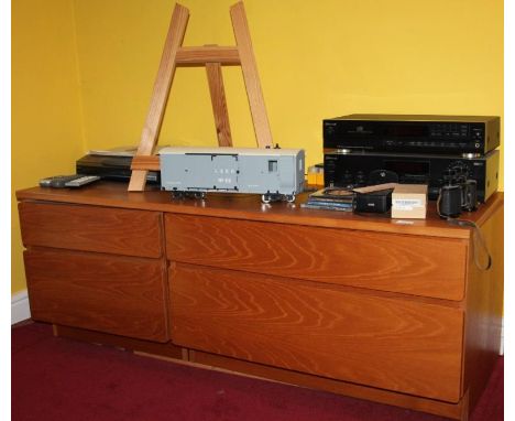 A modern teak side cabinet, Sherwood musical stacking system 22cm high, 42cm wide, 26cm deep, a modern light pine table easel