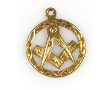A 9ct gold Masonic watch charm, with compass and set square with a part textured outline and hook top, 2.5cm high, 2.5g.