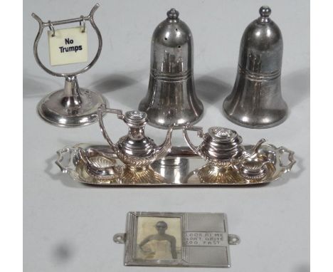 An Elizabeth II silver miniature tea service, comprising teapot, 3cm high, coffee pot, two handled sugar bowl and milk jug, e