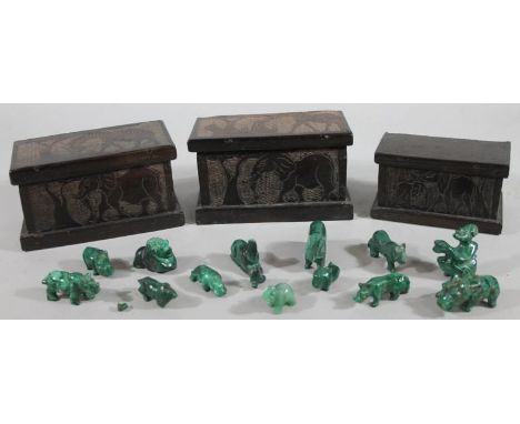 An African poker work casket, the lid decorated with giraffe, another, similar, 11cm high, 19cm wide, 10cm deep, and a furthe