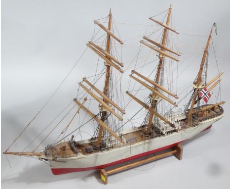 An early 20thC model of a Norwegian Clipper, on stand, 67cm wide.