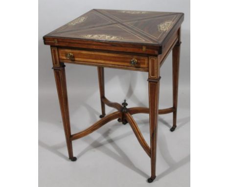 A late Victorian rosewood and marquetry envelope card table, the square top with simulated ivory inlay above a frieze drawer 