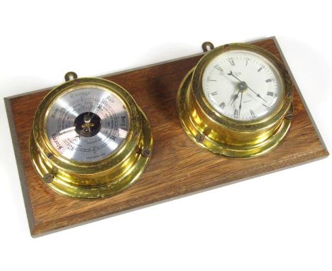 A 20thC wall hanging Weathermaster barometer and clock group, each in circular brass cases with 10cm dia. dials on an oak bac