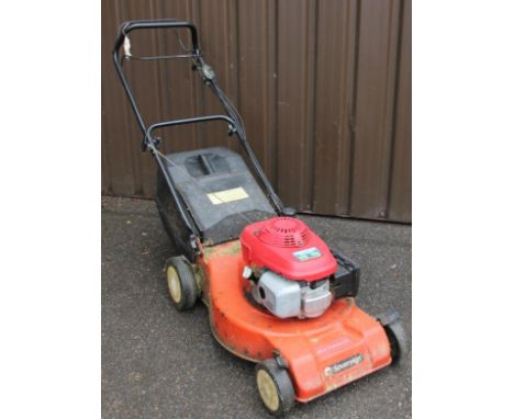 A Honda 5.5 space 360 rotary lawn mower, 52cm wide, with grass box. 