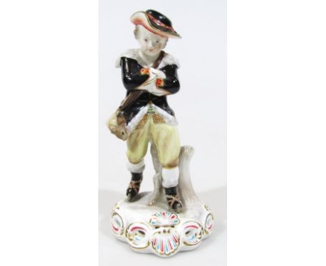 A Derby M Mason figure, of Winter, polychrome decorated on a shell outline base, printed marks beneath, 25cm high.