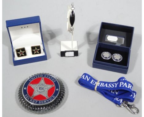 Various United States Secret Service collectables, to include cuff links, 2cm wide, Embassy sash pass, paperweight coaster, o
