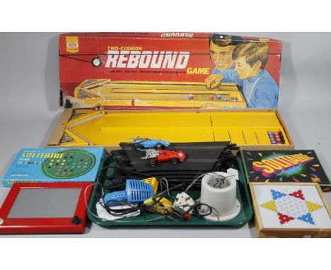 Bygone toys and games, two cushion rebound games, 84cm wide (partially boxed), motor cars and track, bygone Etch a Sketch, so