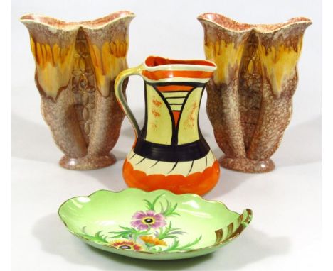 A Carltonware Pansy pattern dish, with shaped outline and gilt highlights on a green ground, 28cm high, a Myott and Sons jug,