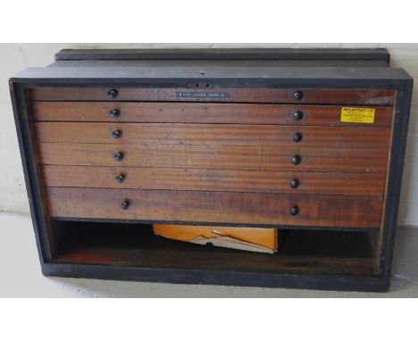 An early 20thC stained pine and mahogany tool chest, with fitted drawers, containing various implements, drill bits, planes, 