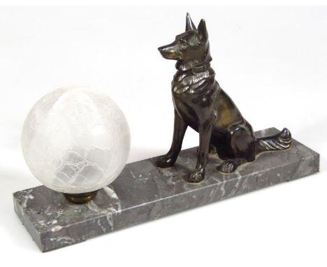 A mid 20thC spelter glass and marble finish dog lamp, in the Art Deco style, 30cm wide.