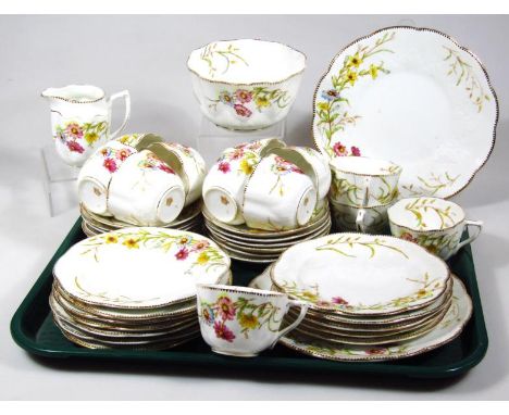 A late 19thC Marguerite pattern part tea service, to include shaped serving plates 23cm wide, cups, milk jugs, side plates, e