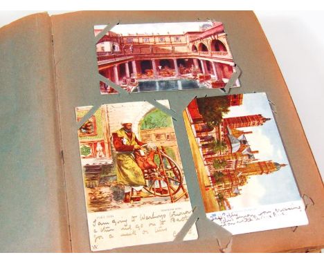 An album of early 20thC and later postcards, to include black and white and coloured scenery, various film stars, Continental