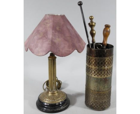 A mid 20thC Corinthian column brass table lamp, with electrical fitting and pink floral shade, 51cm high, and a part harlequi