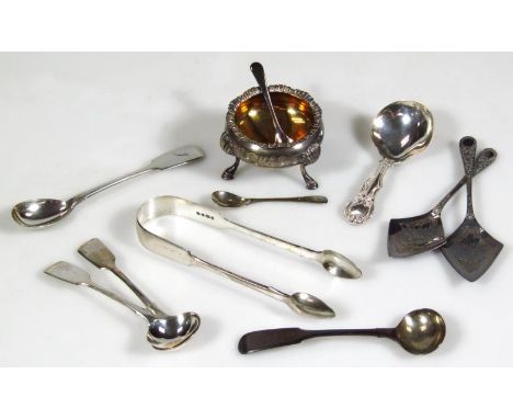 A Victorian silver caddy spoon, stylised Kings Pattern, London 1841, other small silver, a pair of sugar bows, sifter spoons,