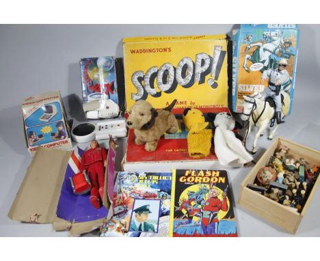 Various bygone games, etc, Sooty hand puppet, 28cm high, stylised Sue hand puppet, toy dog, Six Million Dollar Man boxed figu