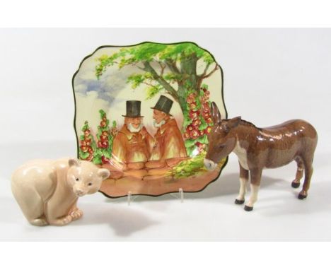 A Beswick donkey, printed marks beneath, 12cm high (AF),  a Poole figure of a bear and a Doulton seriesware Zunday Zmocks pla