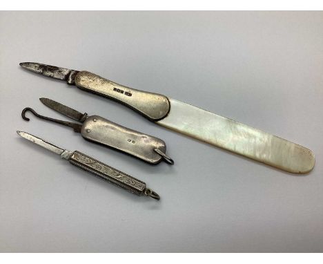 A Hallmarked Silver Mounted Mother of Pearl Paper Knife, (CWF Sheffield 1914) with folding single blade, 18.4cm open length; 