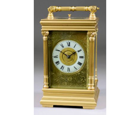 A Late 19th/Early 20th Century French Carriage Clock, the 2.25ins diameter cream chapter ring with Roman numerals, gilt brass
