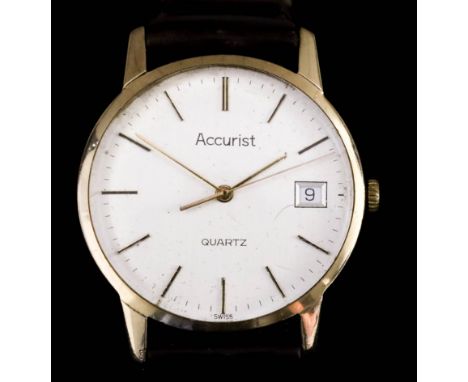 An Accurist Quartz Wristwatch, Modern, 9ct Gold Cased, the silvered dial with gold baton numerals, sweep second hand and date