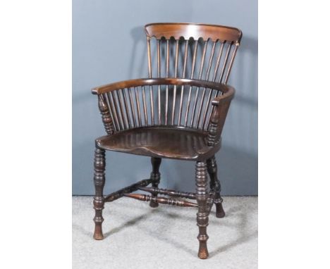 A 19th Century Mahogany Stick Back Windsor Armchair, with curved two-tier back, dish seat on turned supports and underframe