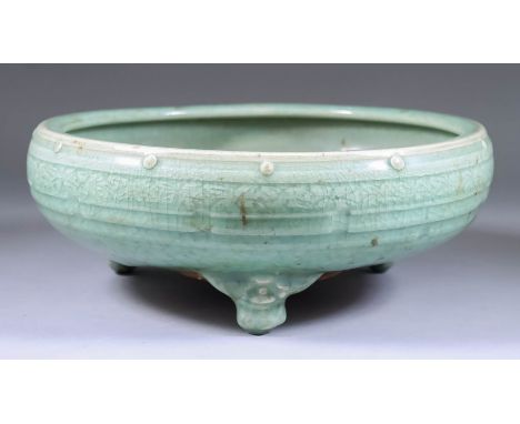 A Chinese Celadon Tripod Censer, Late Ming, with trigram design to the body, of Longquan type, 11.75ins (29.8cm) diameter Pro
