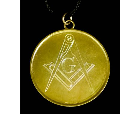 A 14ct Gold Masonic Medallion or Token, the face with square and compass, the reverse with working tools, 35mm diameters, gro