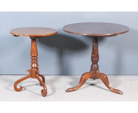 Two 19th Century Mahogany Circular Tripod Tables, the smaller table on turned central column and three scroll supports, 20ins