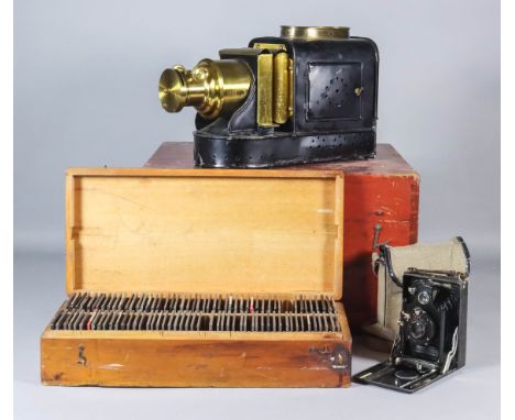 A "Pamphengos" Magic Lantern, Late 19th Century, patented and invented by W. C. Hughes, 17.5ins extended, in original wooden 