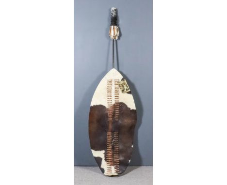 A Zulu War Shield of the Ingobamakosi Regiment, Modern, of animal skin and with a pole, 54ins, a modern print of a Zulu warri