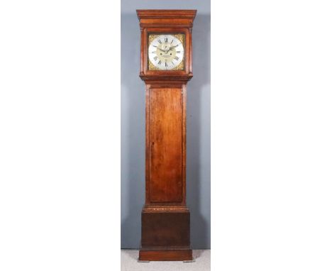 An 18th Century Oak Longcase Clock, by Thomas Quested of Wye (Ashford, Kent), the 12ins square brass dial with wide silvered 